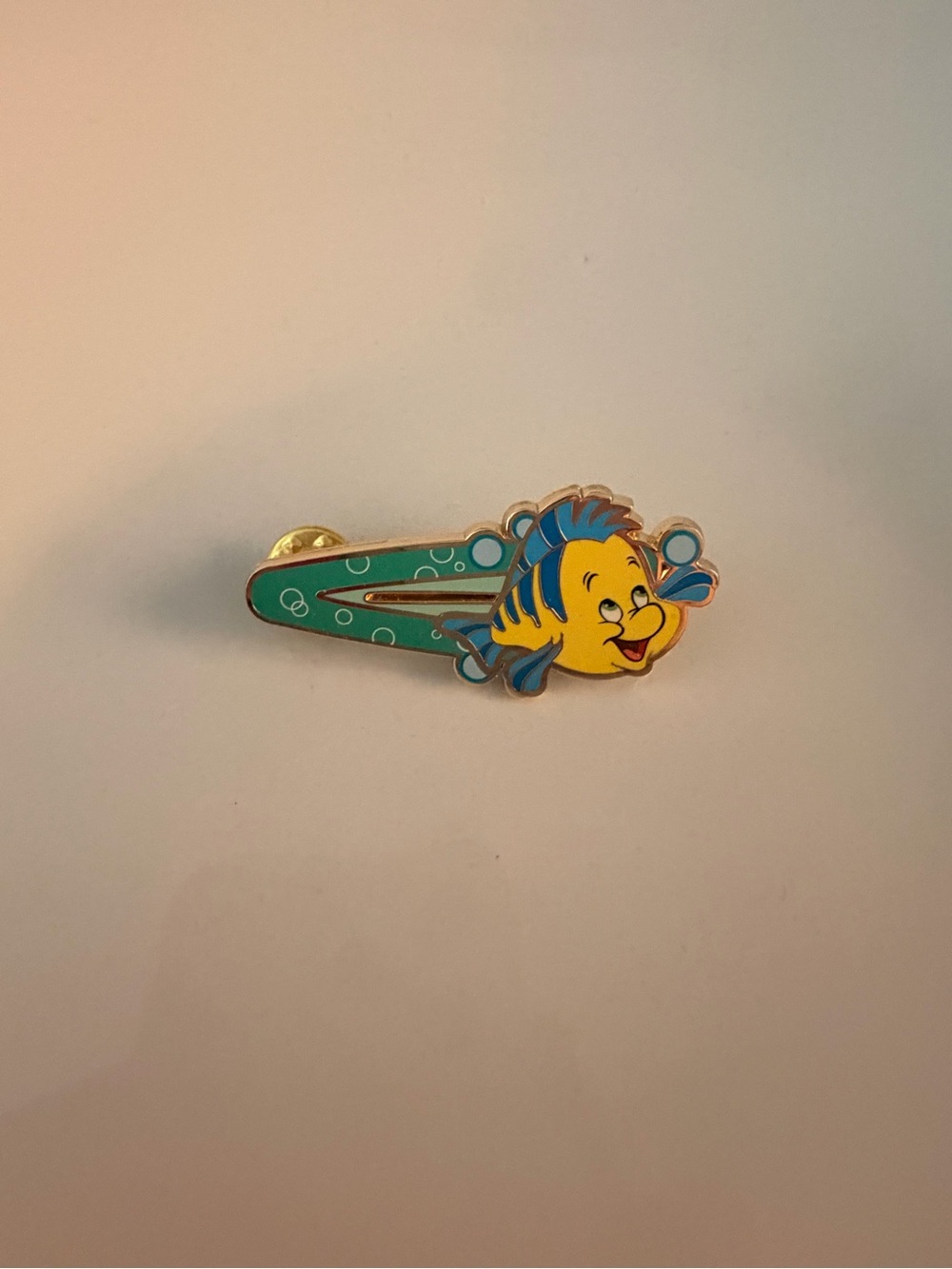 Disney Flounder enamel pin from the Sidekicks Hair Clips collection
